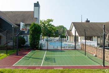 Basketball court with a white fence